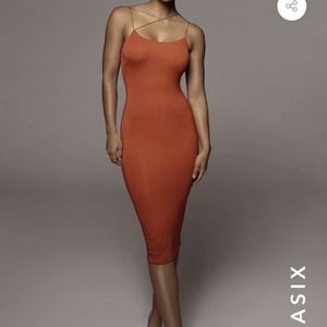 JluxLabel black diagonal strap dress.